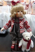 Кукла коллекционная  Девочка с игрушкой  37*15*10см...